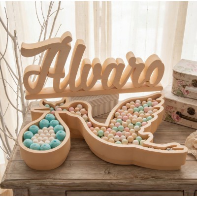 Nombre de corcho con cigueña de chuches